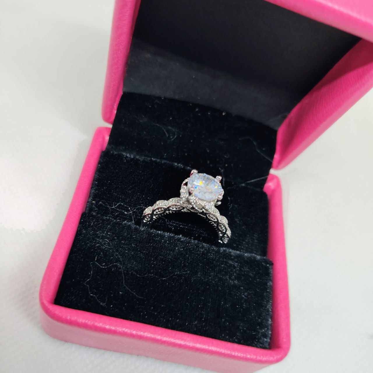 Luminous Embrace Brilliant Center Stone with Twisted Band Womens Ring