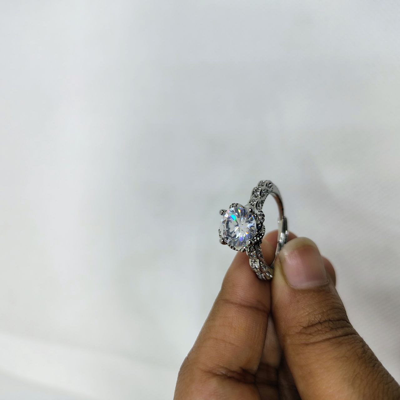 Luminous Embrace Brilliant Center Stone with Twisted Band Womens Ring