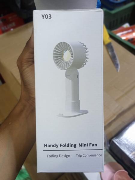Handy Phone Mini Fan Y03 is a portable, rechargeable handheld fan designed for personal cooling