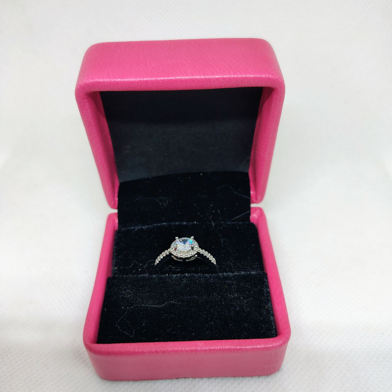 Luminous Embrace Brilliant Center Stone with Twisted Band Womens Ring