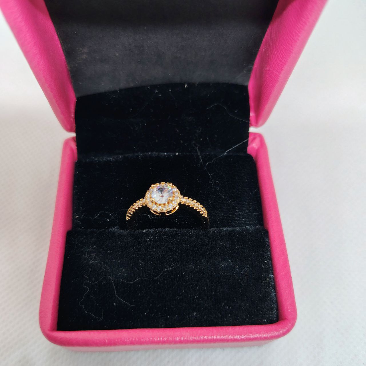Luminous Embrace Brilliant Center Stone with Twisted Band Womens Ring