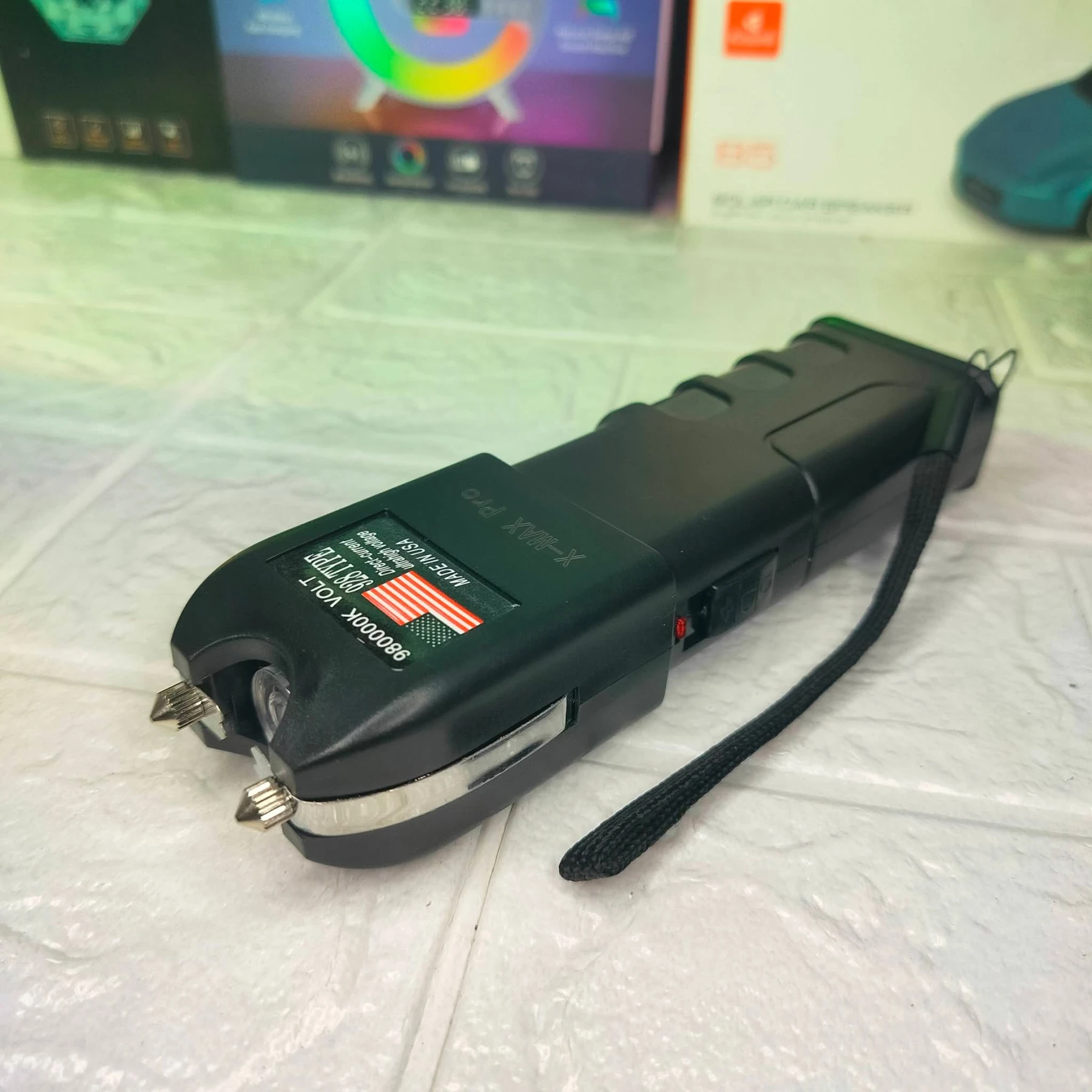 928 Type stun gun with a built-in flashlight.